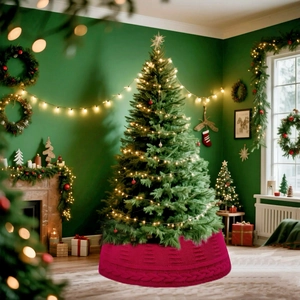 Gros plan du cache-pied de sapin de Noël en tricot rouge pour une décoration de fête