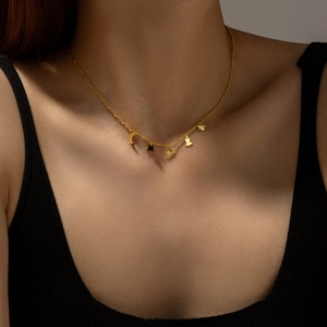 S925 sterling silver gold-plated necklace featuring moon star and rocket pendants
