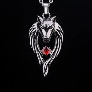 Luminous silver wolf head pendant with red square gemstone on a dark background