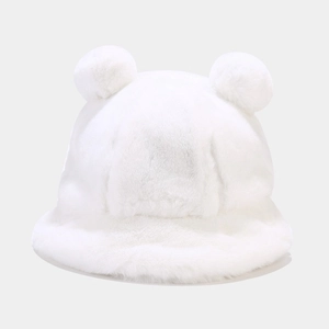 Close-up of white plush bucket hat with soft faux fur texture and large fluffy ears