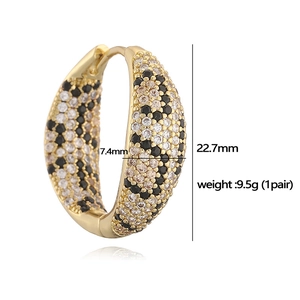Elegant gold square earrings with white and black cubic zirconia leopard pattern