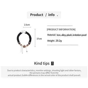 Detailed size and material chart for the black plush choker with star tassel charms