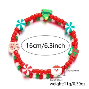 Detailed view of Christmas beaded bracelet with Santa, reindeer, and tree charms