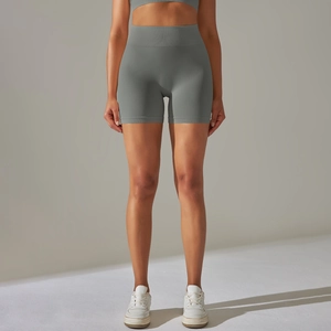 Detailed texture of seamless high-waist grey yoga shorts with peach lift effect