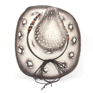 Detail of ombre straw cowboy hat with hollow weave and wooden bead decorative band