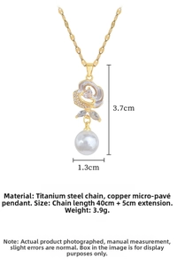 Detail of rose gold flower pendant with heart crystal, pearl drop and chain specs