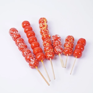 Set de seis espinos de caramelo artificiales realistas con glaseado y sésamo