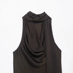 Deep brown satin sleeveless halter top with elegant draped neck and fringe details
