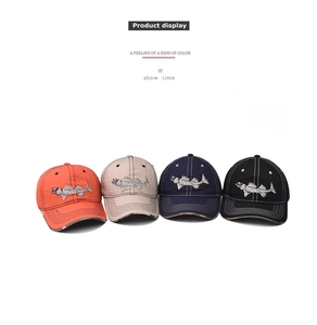 Detail of fish bone embroidery on cotton baseball caps in multiple colors