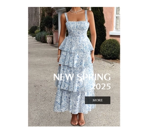 Detail of blue and white floral tiered dress with square neck and spaghetti straps
