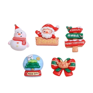 Christmas themed resin accessories featuring Santa, snowman, and deer for DIY jewelry