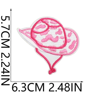 Pink and white embroidery patch showing dimensions 5.7cm height and 6.3cm width
