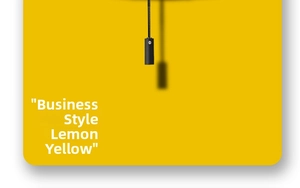Close-up of the automatic umbrella handle with wrist strap against a lemon yellow backdrop