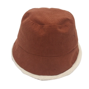 Caramel corduroy bucket hat with thick white faux fur lining for winter warmth