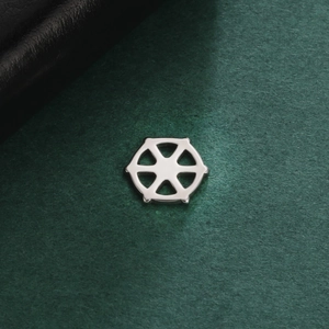 Macro shot of silver hexagonal stainless steel connector for DIY jewelry crafting