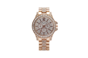 Detail of rose gold fashion watch featuring iced-out crystal bezel and three sub-dials