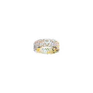 Gold plated cubic zirconia eternity ring featuring baguette cut stones on white background