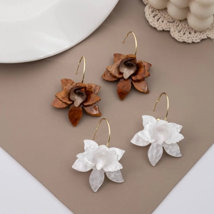 French gardenia petal earrings in brown wood grain and white shell finish with gold hooks