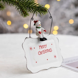 Christmas snowman welcome sign made of metal and resin with Merry Christmas text