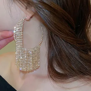 Elegant gold-plated geometric round hoop earrings with sparkling tassel rhinestones