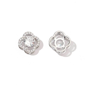 Detailed front and back view of silver clover stud earrings with clear center zircon stones