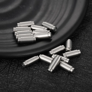 Macro view of precision stainless steel step shafts with brushed metal texture and finish