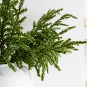 Realistic green PE cedar branches in white ceramic vase for Christmas home decor