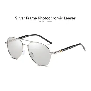 Classic aviator sunglasses featuring silver frames and photochromic lenses for driving