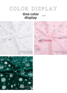 Detail of plush Christmas fabric with silver snowflake patterns in white, pink, and green
