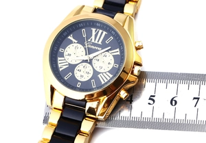 Detailed measurement showing case diameter of two-tone Geneva steel men's quartz watch