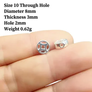 Detailed view of silver coin-shaped DIY beads with dimensions 8mm diameter and 3mm thickness