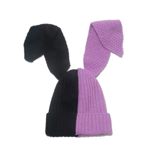 Winter knitted rabbit hat with long ears in purple and black split color block