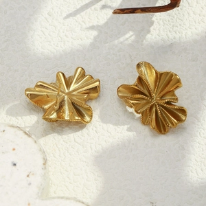 Detail of 18K gold plated stainless steel floral studs with beaded edges and folds