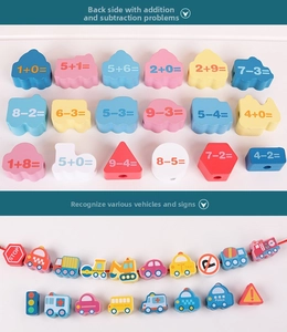 Detail of wooden blocks showing math equations and colorful vehicle illustrations