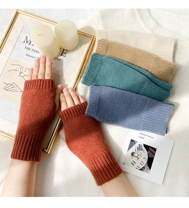 Vertical ribbed knit texture and assorted colors of warm fingerless gloves