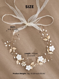 Detailed dimensions of bridal hair band with white flowers, gold leaves and pearls