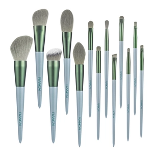 13-piece light blue makeup brush set with wooden handles and green gradient ferrules