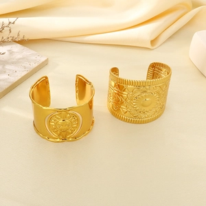 Golden stainless steel sun face and mandala texture open cuff bracelet for women