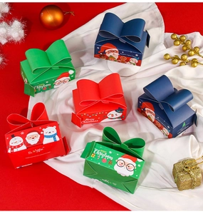 Detailed Christmas gift boxes with bow-knot lids and cartoon Santa patterns on silk cloth