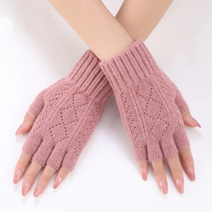 Close-up of pink knit fingerless arm warmers with diamond hollow pattern for women