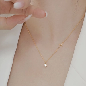 Minimalist S925 sterling silver gold necklace with round pendant and side cross detail