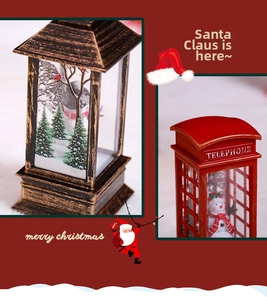 Macro detail of bronze vintage lantern and red telephone booth Christmas lamp decor