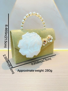 Golden evening bag with pearl handle and white flower decor including size dimensions
