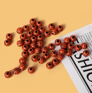 Detailed view of orange basketball acrylic loose beads for DIY jewelry making