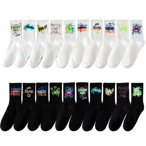 Graffiti sport socks in black and white featuring street style lettering and cotton texture