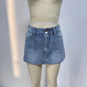 Detail view of high waist light blue denim skirt with dual metal buttons and five pockets