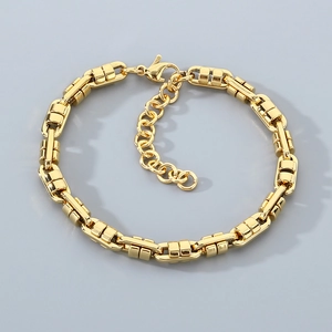Close-up of golden Byzantine chain bracelet with lobster clasp and adjustable tail link