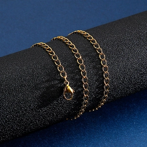 Classic gold stainless steel curb chain necklace with lobster clasp on a display