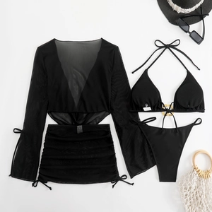 Detail of 3-piece black bikini with gold ring trim and drawstring mesh beach cover-up