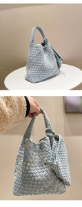 Detail of light blue woven hobo bag with matching mini pouch and knotted handle